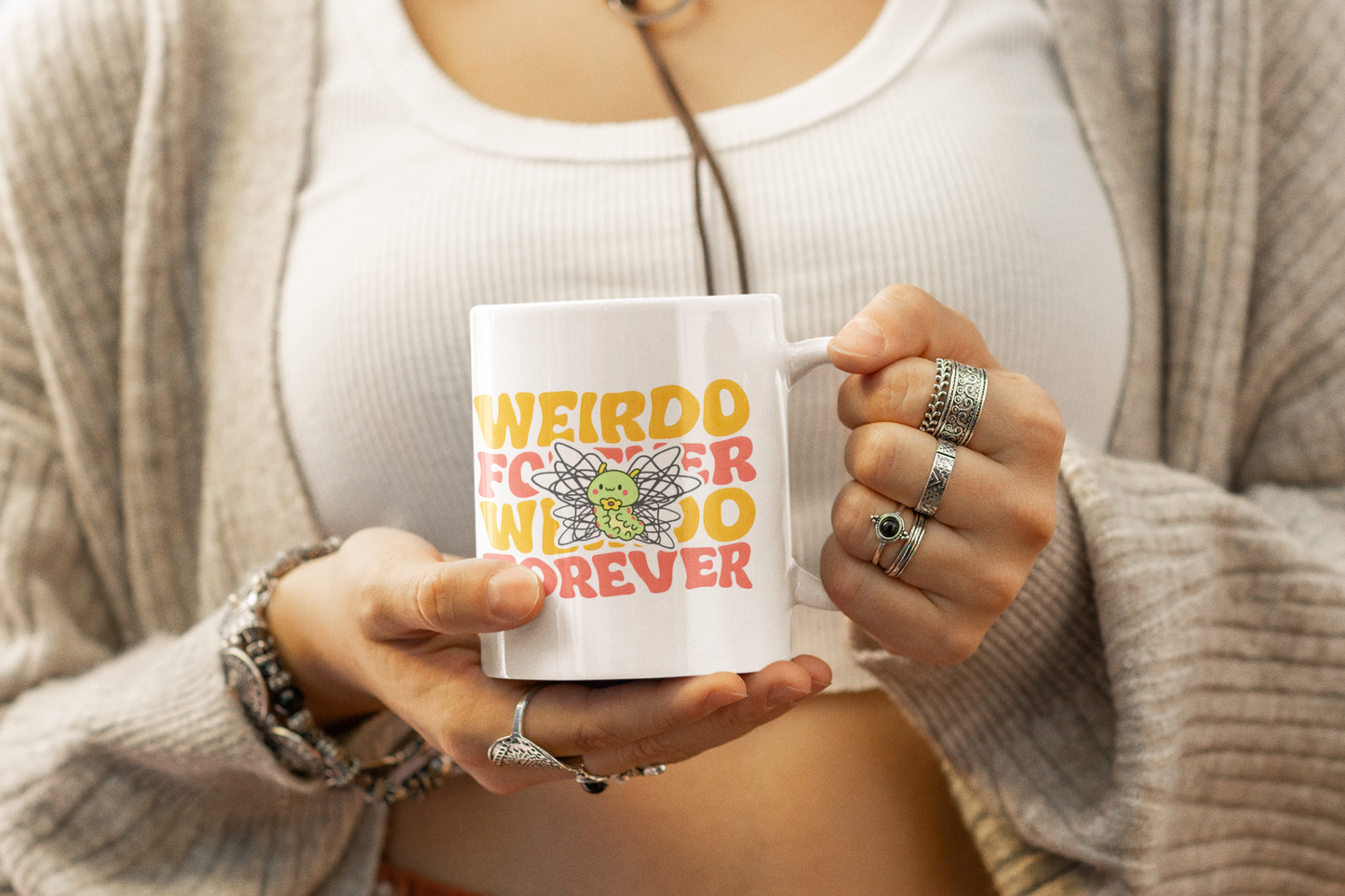 11 oz coffee mug mockup of a female model wearing boho-styled garments