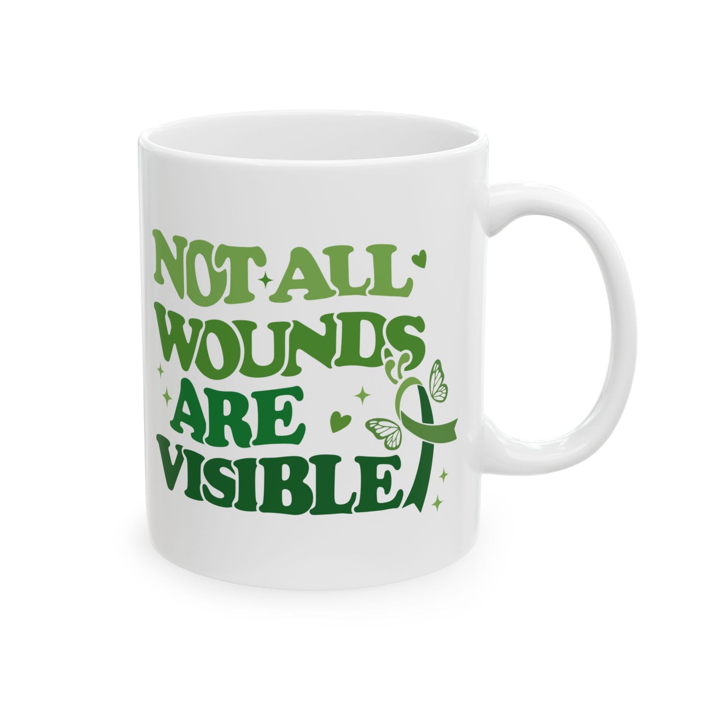 White glossy ceramic mental health awareness mug with green “Not All Wounds Are Visible” butterfly and green ribbon design, shown from the front.
