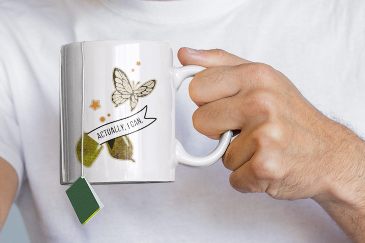 mug mockup featuring a male hand model in his pajamas