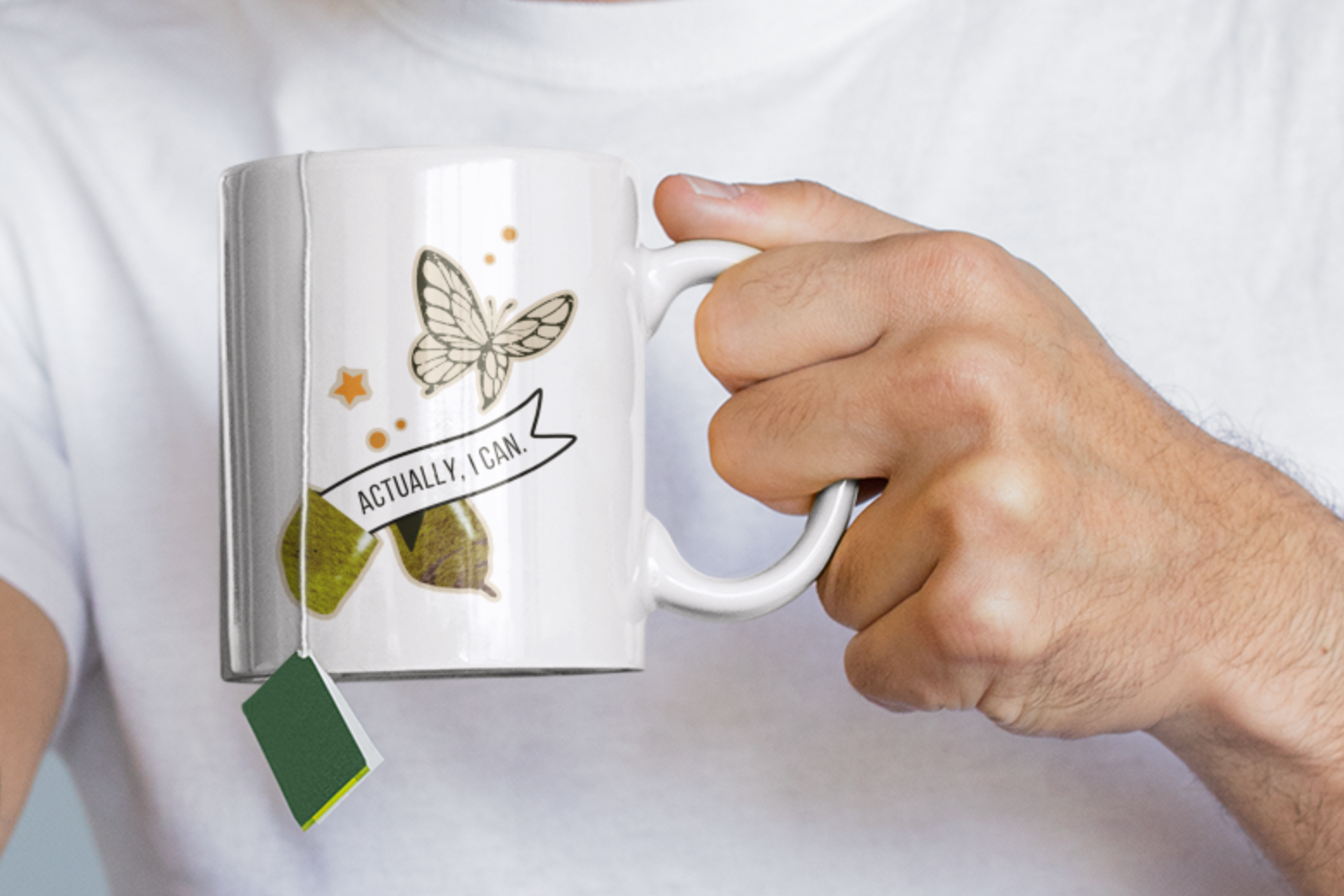 mug mockup featuring a male hand model in his pajamas
