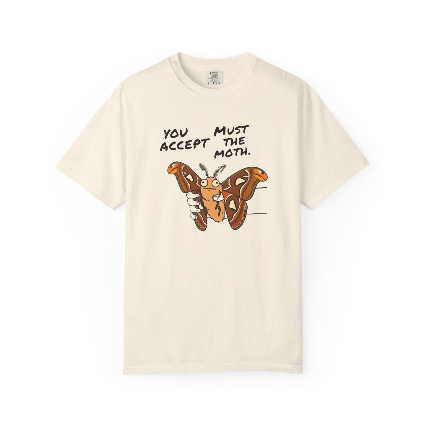 Cream Atlas Moth graphic t-shirt featuring the phrase "You Must Accept The Moth" with funny internet humor design.