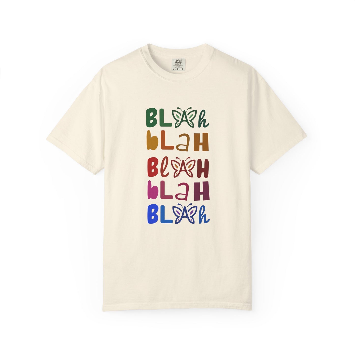 Cream t-shirt with colorful 'Blah Blah Blah' text and butterfly graphics on a white background