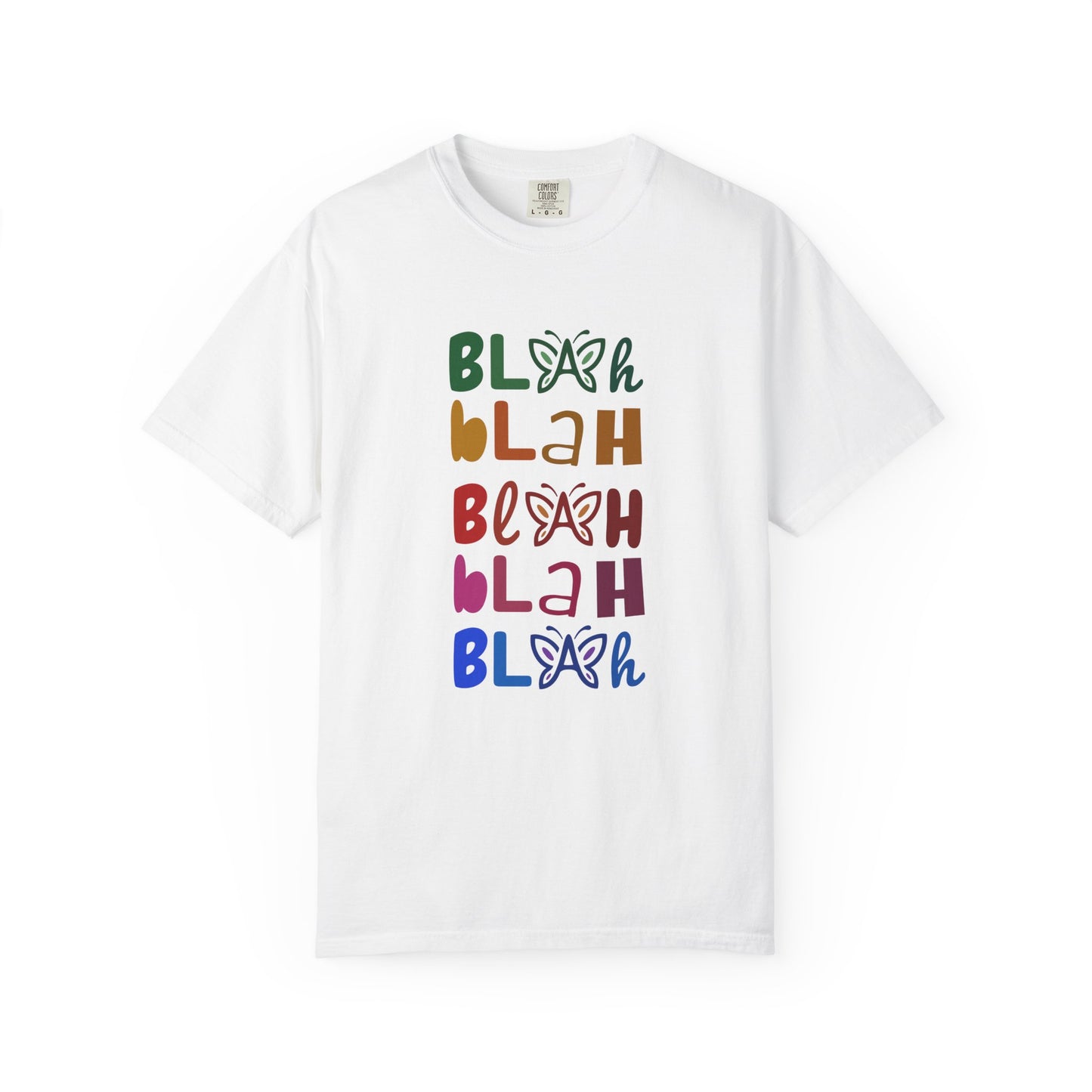 White t-shirt with colorful 'Blah Blah Blah' text and butterfly graphics on a white background