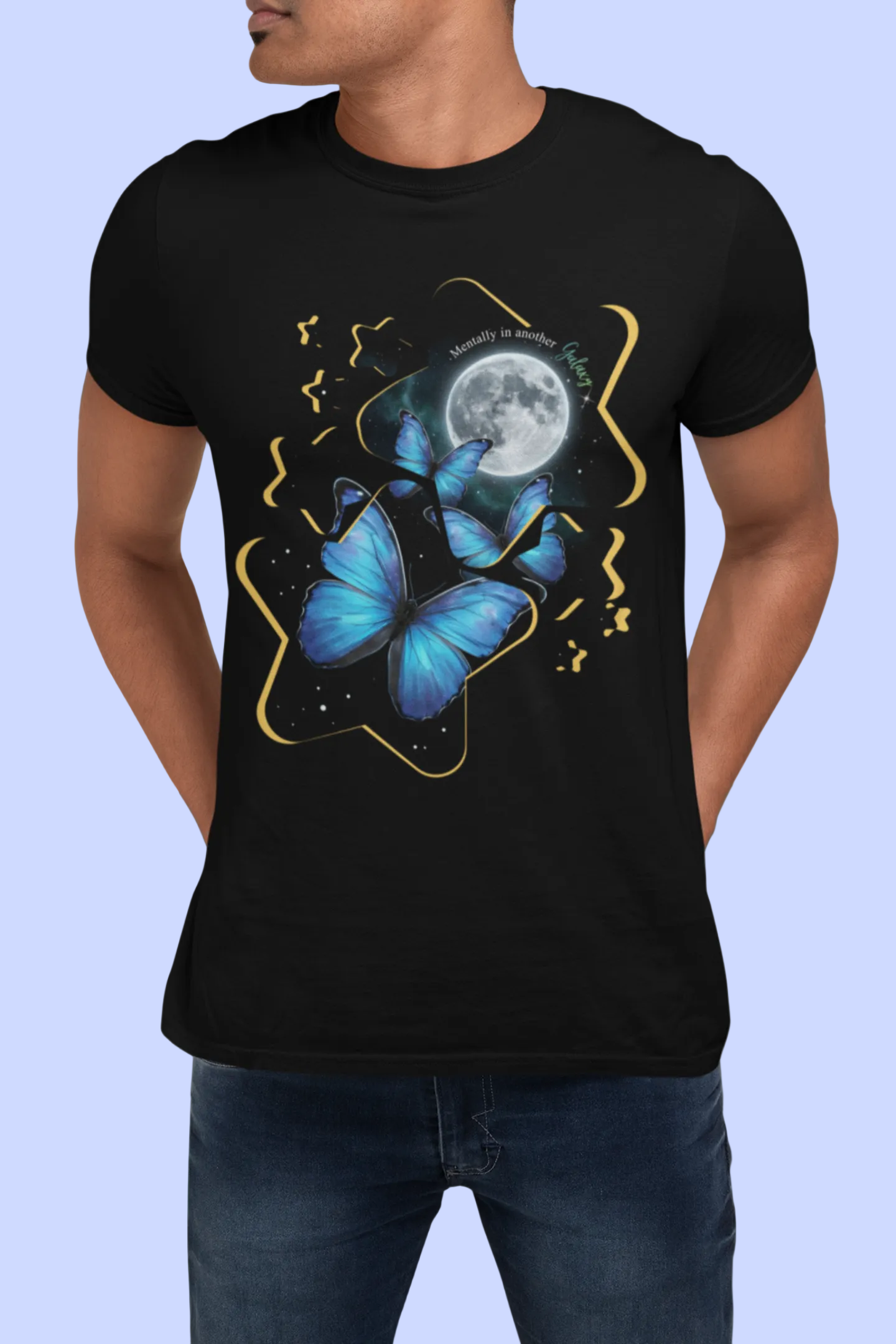 Model wearing blue morpho butterfly celestial moon galaxy t-shirt on a plain background