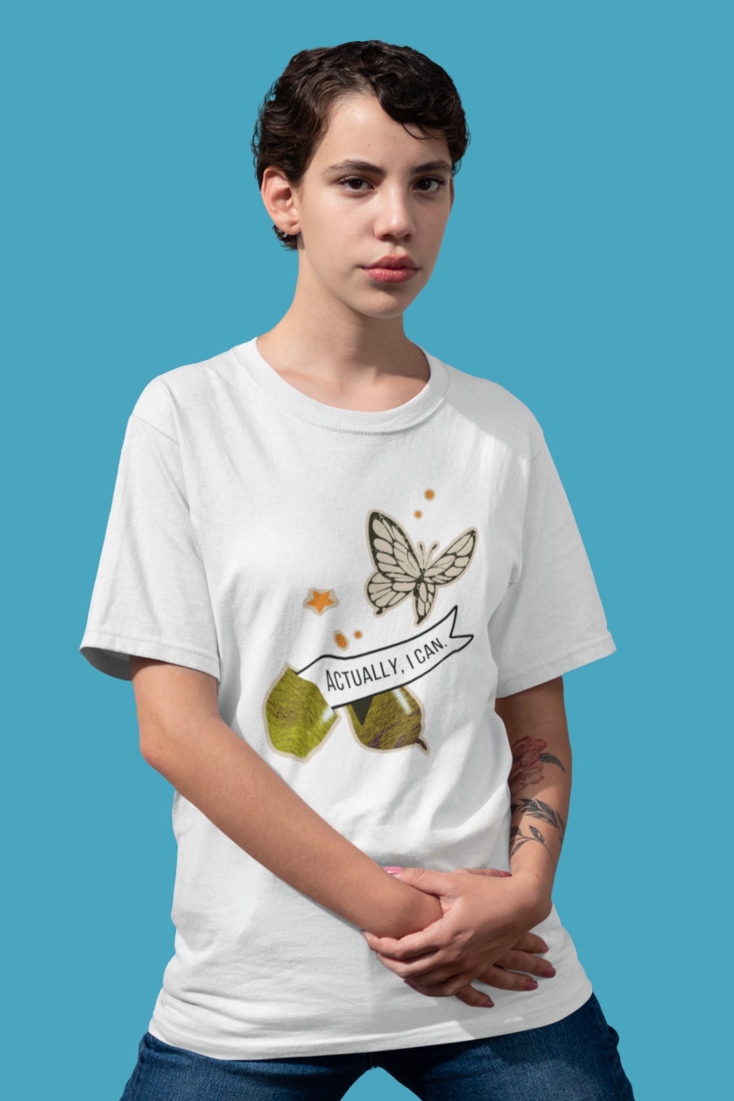 woman with short hair wearing a motivational courage butterfly actually i can shirt