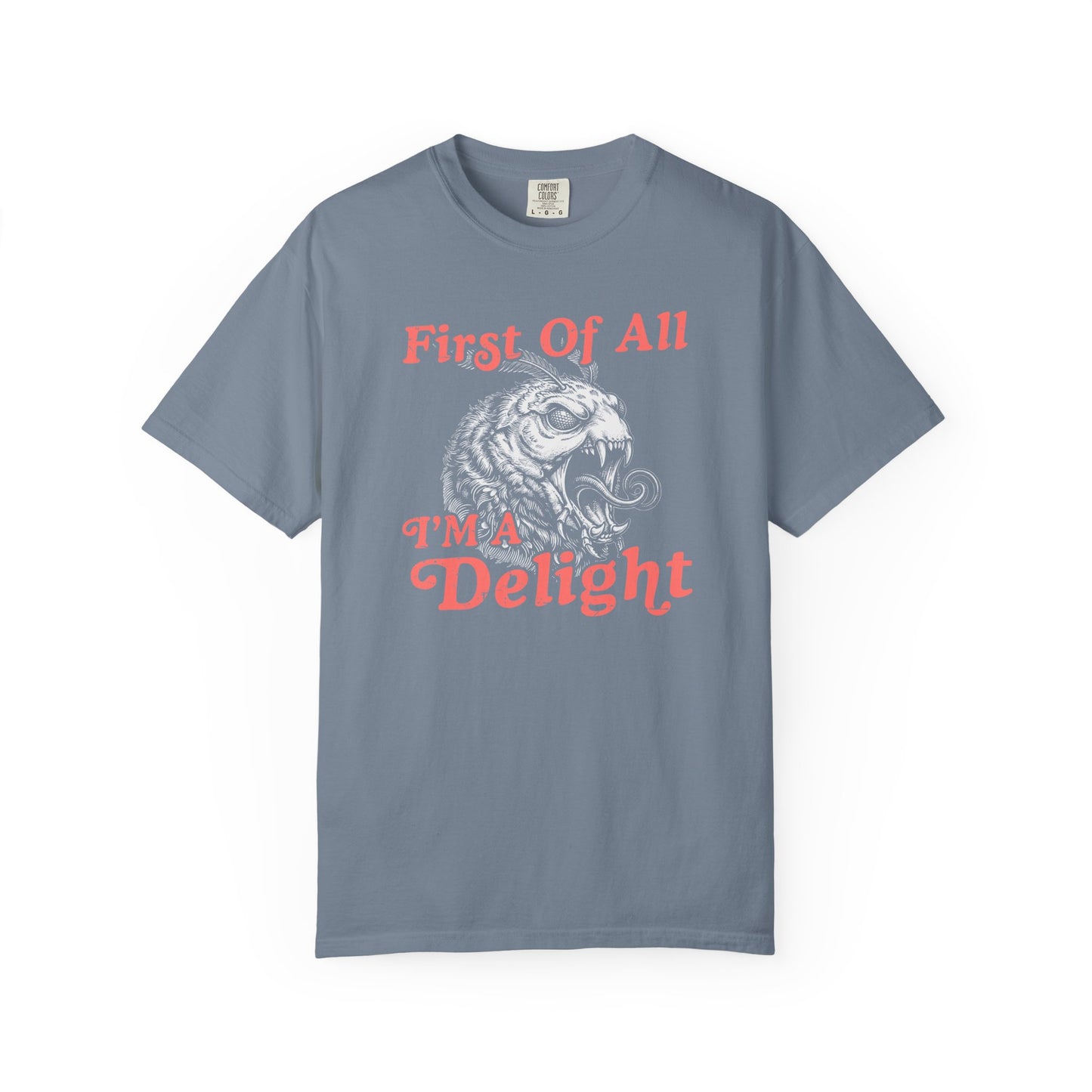 Blue t-shirt with vintage coral text and a monster moth graphic that says First Of All I’m a Delight.