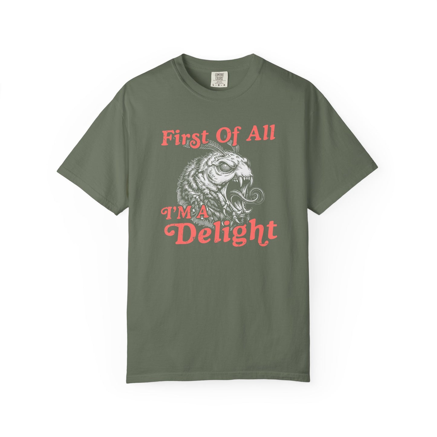 Green t-shirt displaying a funny sarcastic monster moth graphic with the phrase First Of All I’m a Delight.