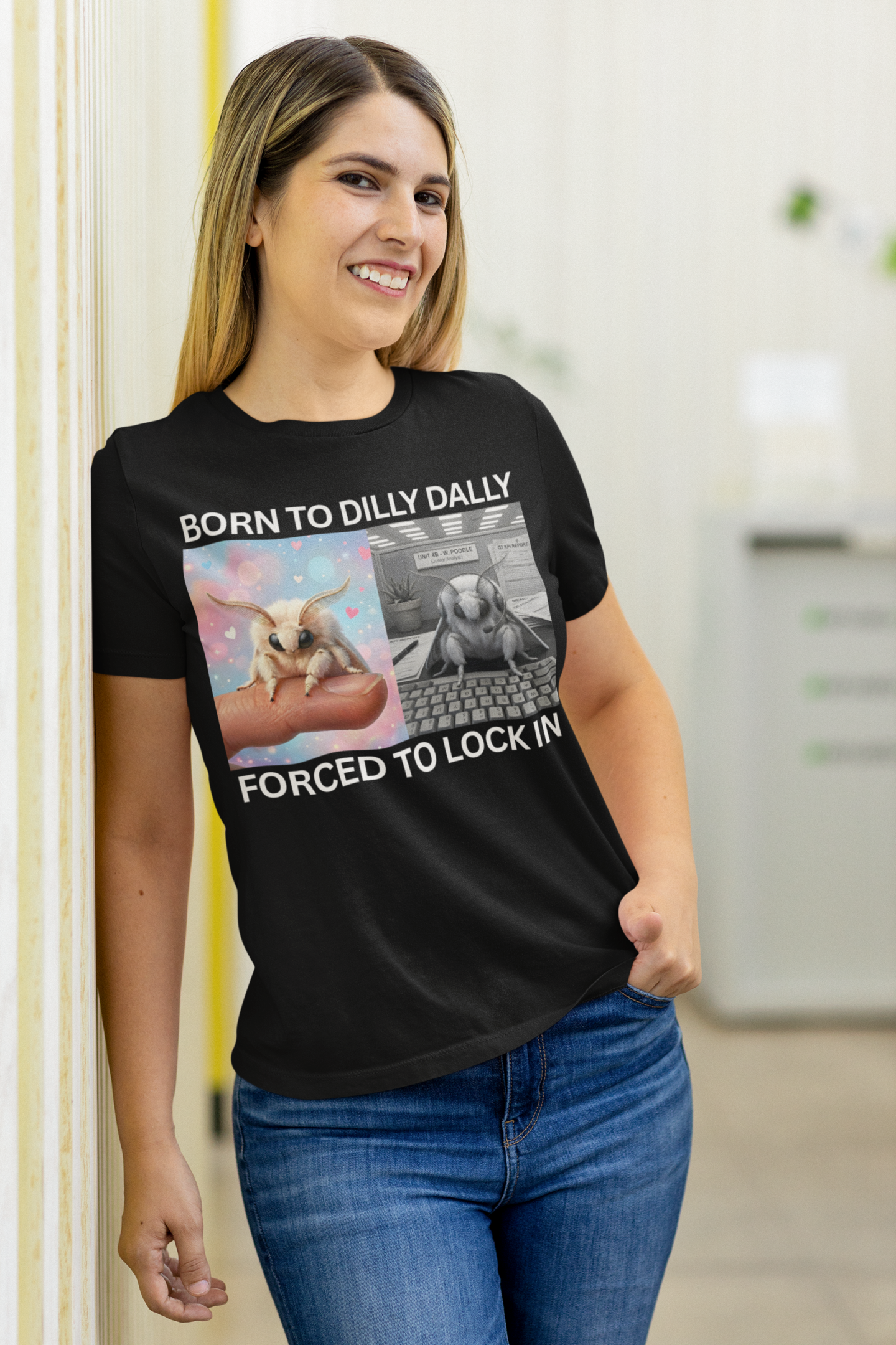 Woman wearing funny moth meme shirt born to dilly dally forced to lock in, standing indoors.