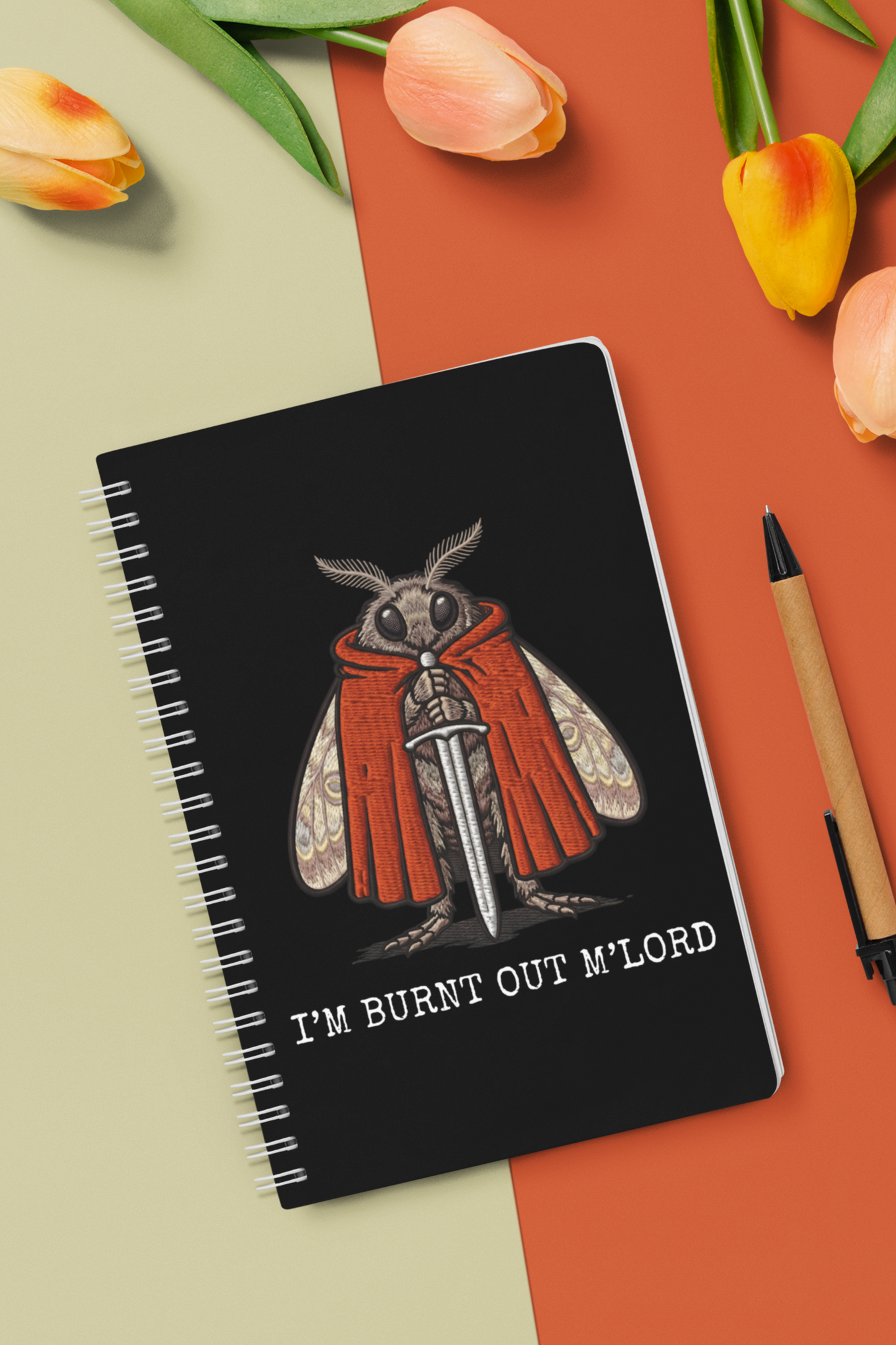 funny moth meme spiral notebook with medieval moth design on colorful background with flowers and pencil