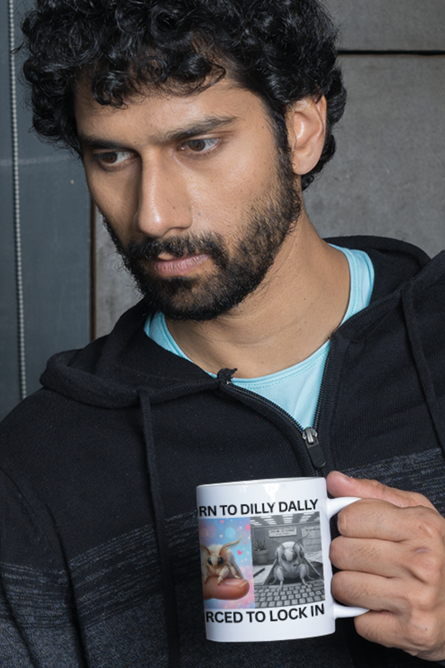 Man holding funny moth procrastination meme coffee mug with Born to Dilly Dally phrase