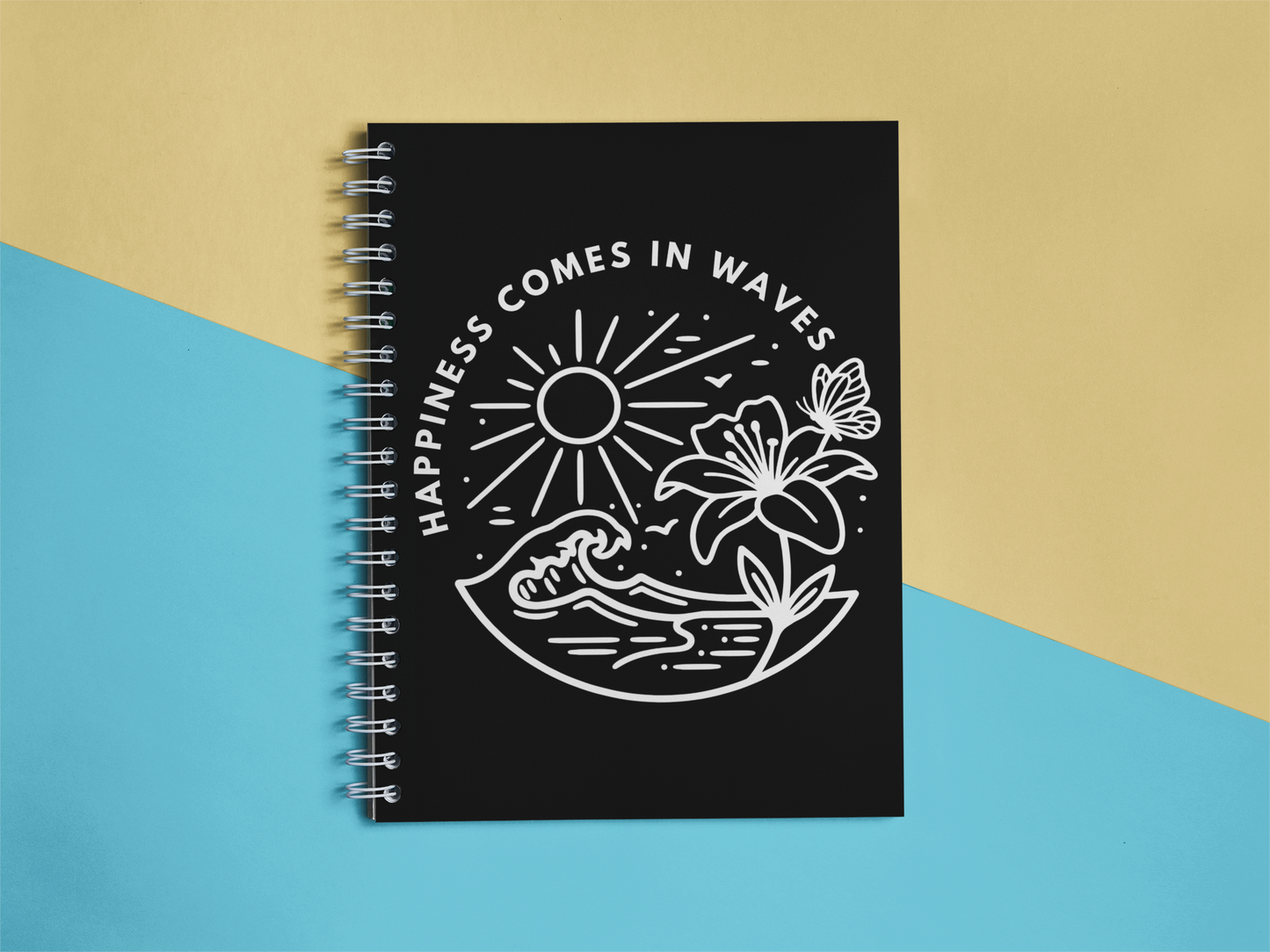 Happiness Comes in Waves beach butterfly spiral notebook on a two-tone background