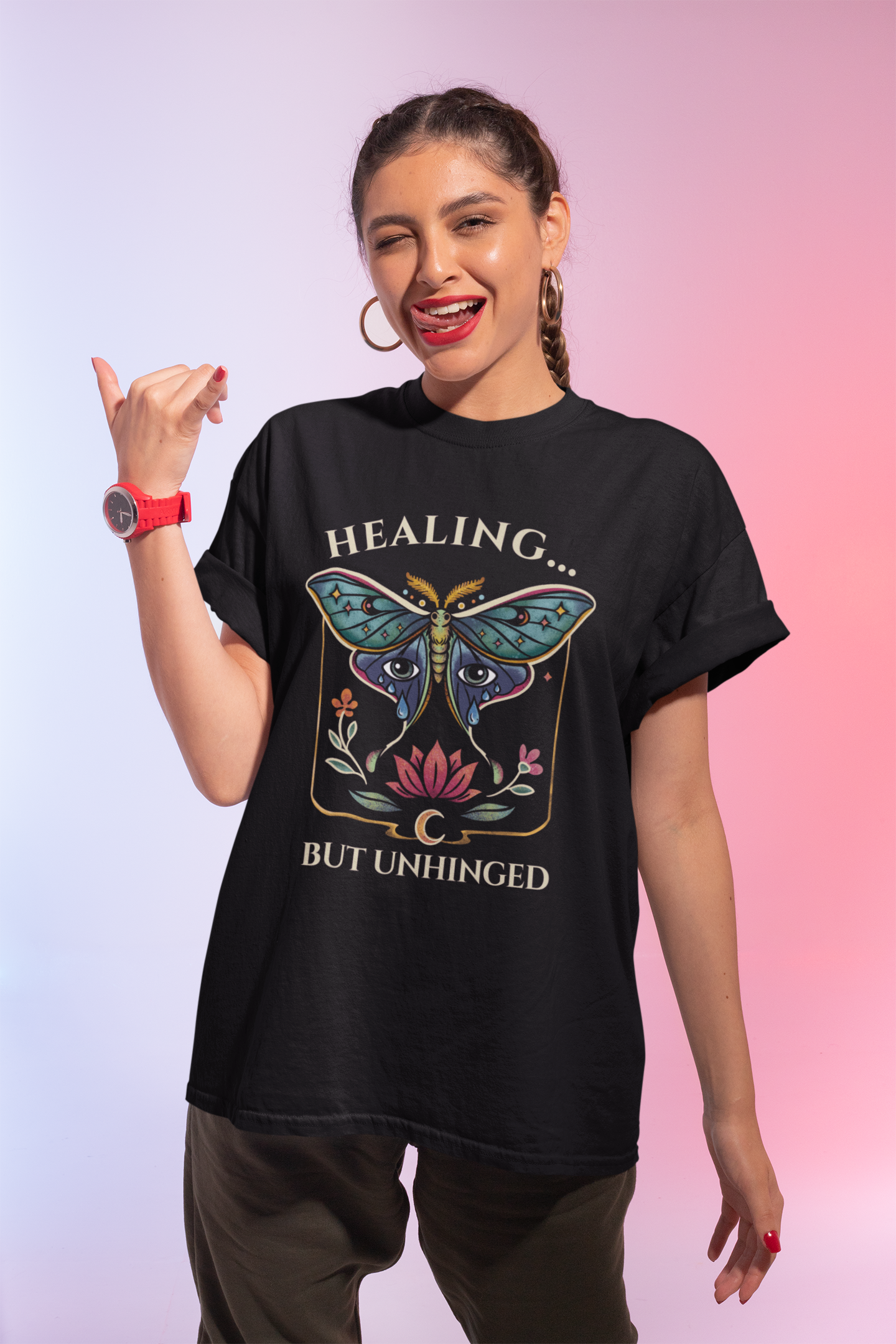 mockup of woman model doing a surf hand sign and wearing a luna moth black tee
