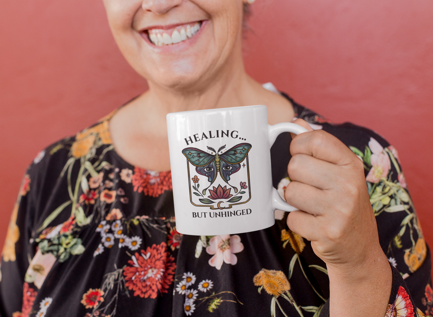 11 oz coffee mug mockup featuring a smiling and elderly female hand model