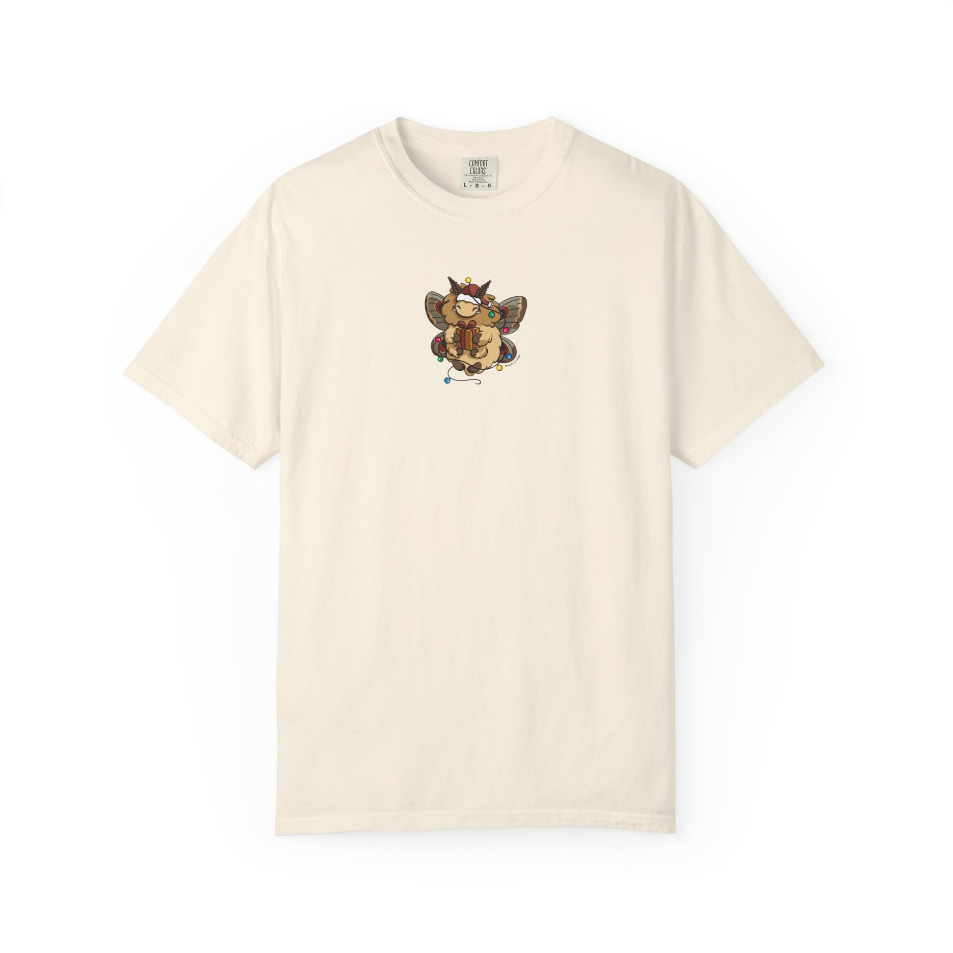 Cream Comfort Colors holiday moth shirt with cozy winter moth holding gift and tangled Christmas lights.