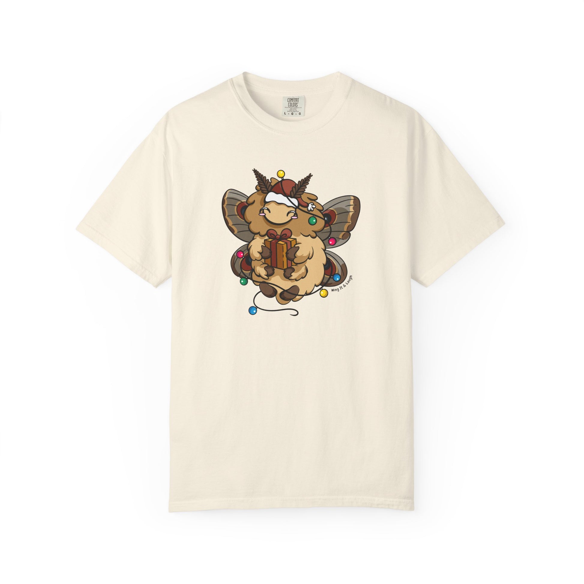 Cream unisex t-shirt with a moth holding a present with Christmas lights on a white background