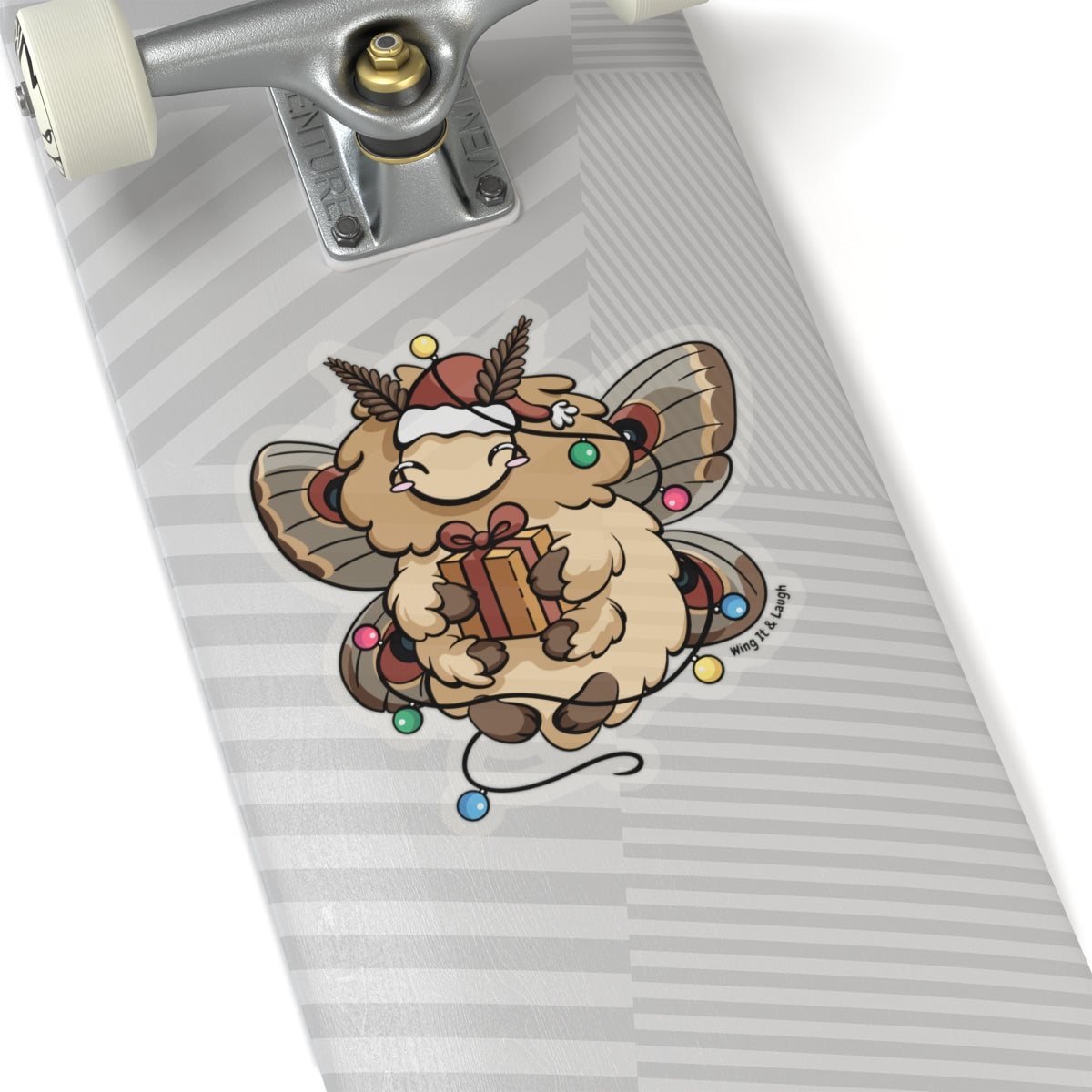 Skateboard with a fluffy moth holding a gift and surrounded by Christmas lights, on a white background