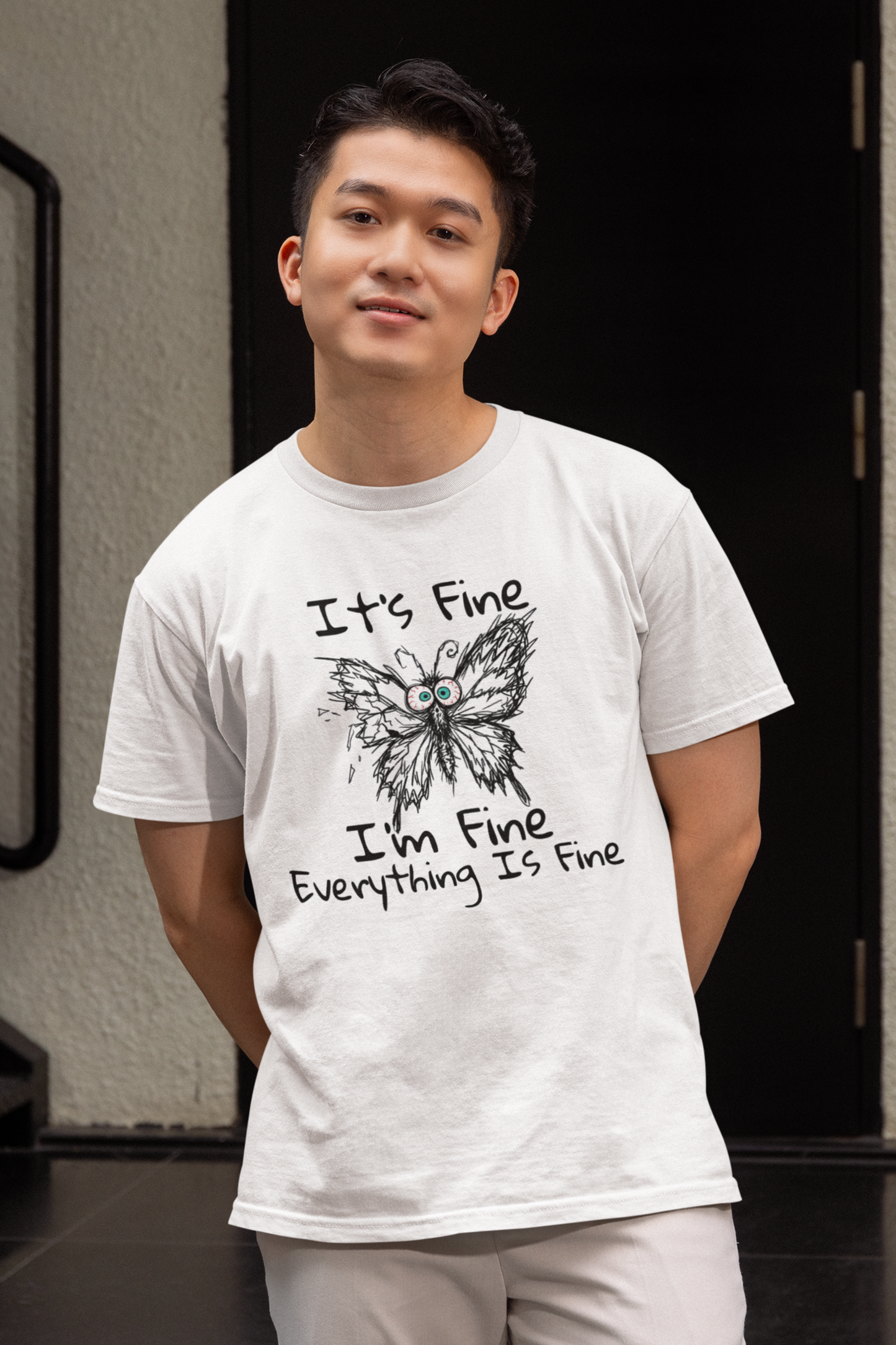 Man wearing white It's Fine I'm Fine Everything Is Fine butterfly anxiety graphic t-shirt