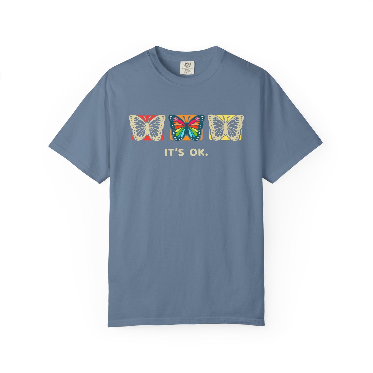 blue 'it’s ok' butterfly shirt featuring with three butterflies and simple positive affirmation in bold cream text