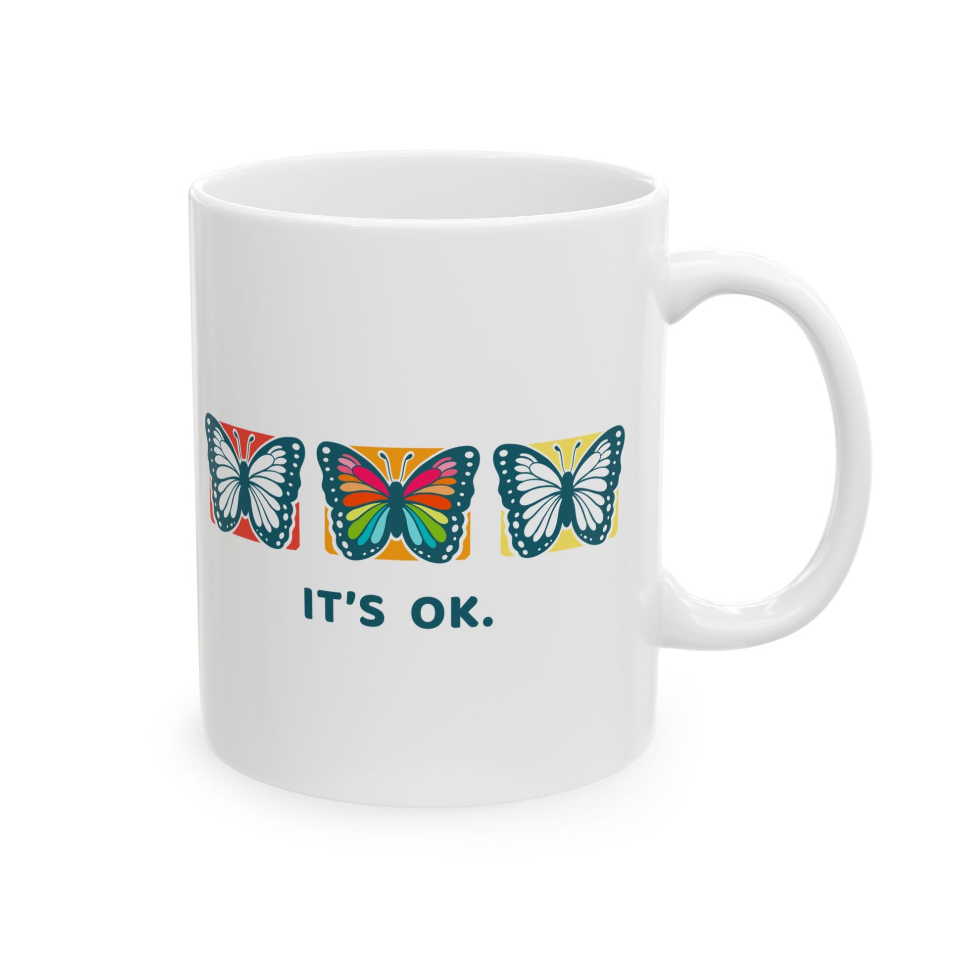 white ceramic coffee 11oz mug with colorful butterfly design and 'it's ok' text on a white background