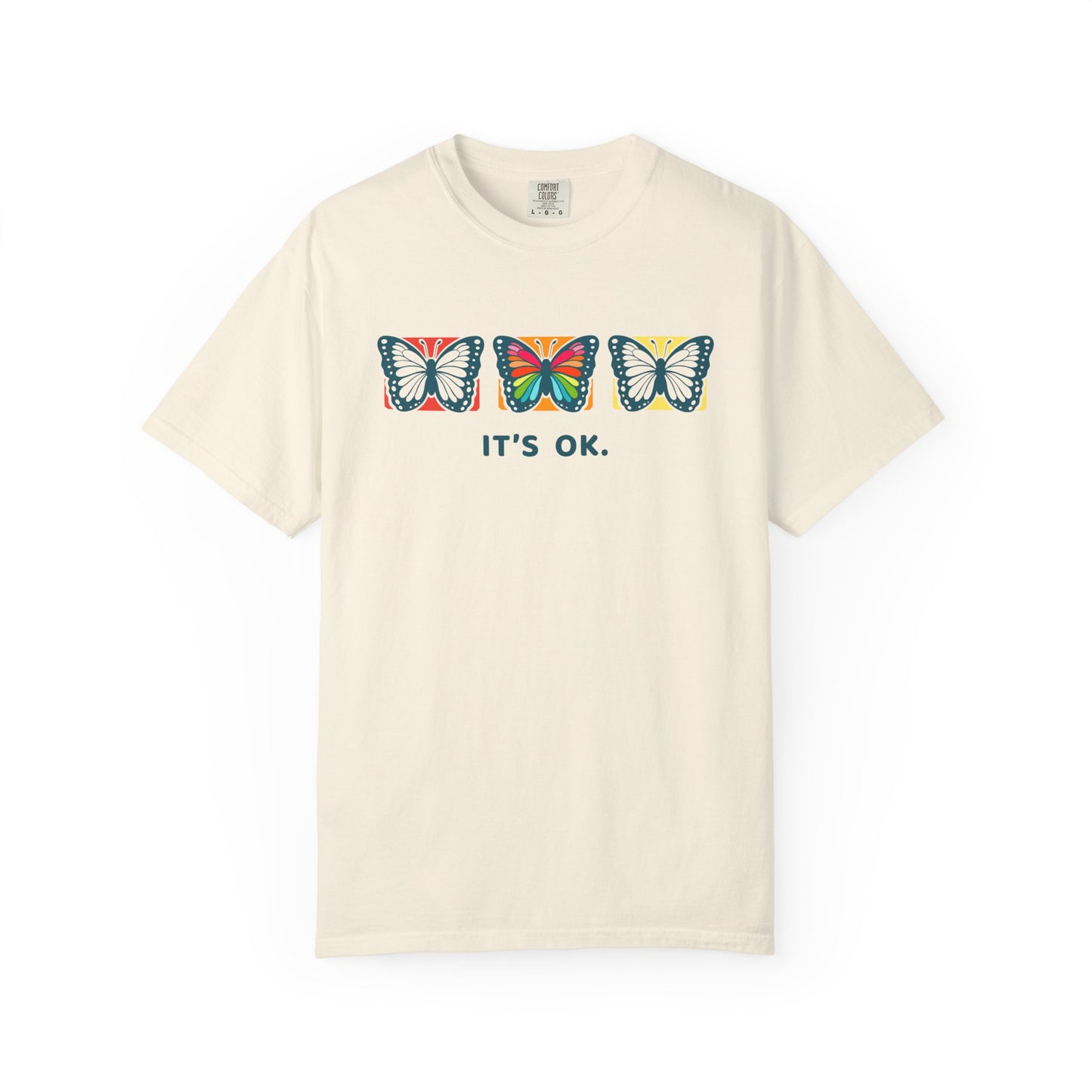 cream 'it’s ok' butterfly shirt featuring with three butterflies and simple positive affirmation in bold blue text