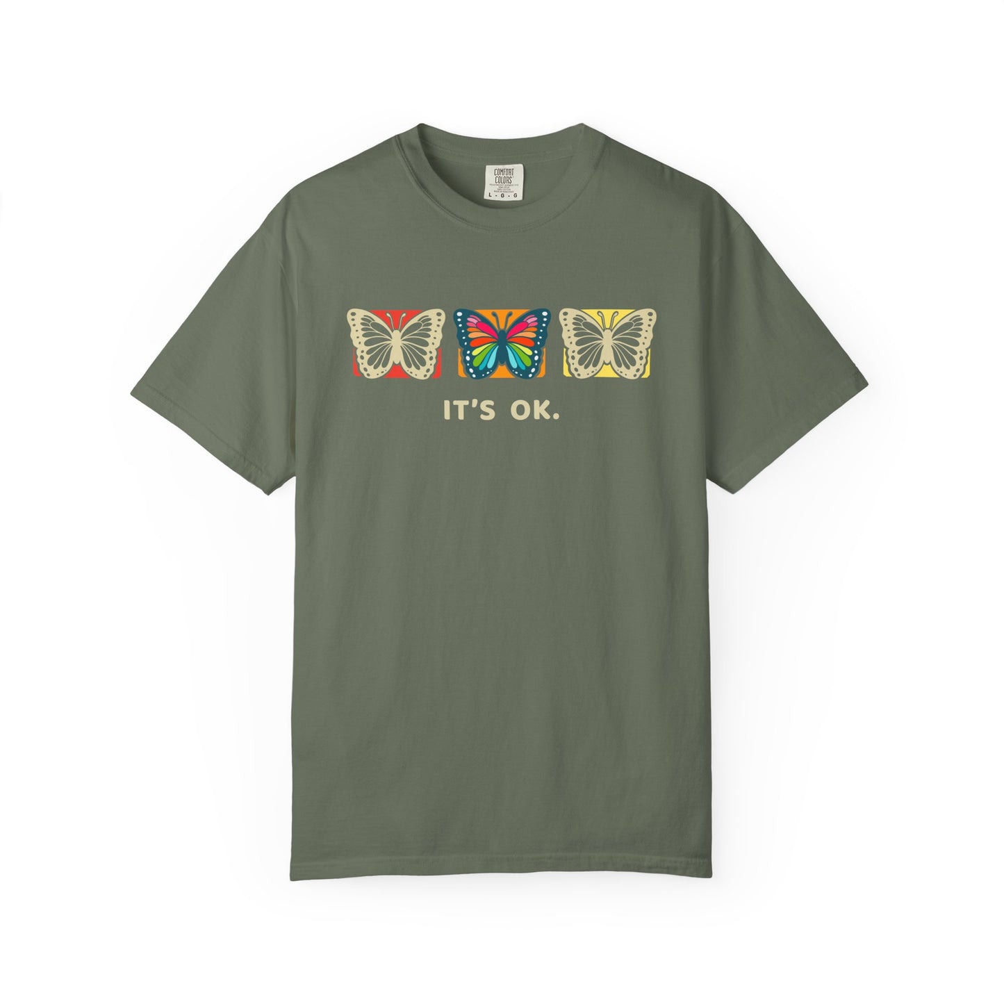green 'it’s ok' butterfly shirt featuring with three butterflies and simple positive affirmation in bold cream text