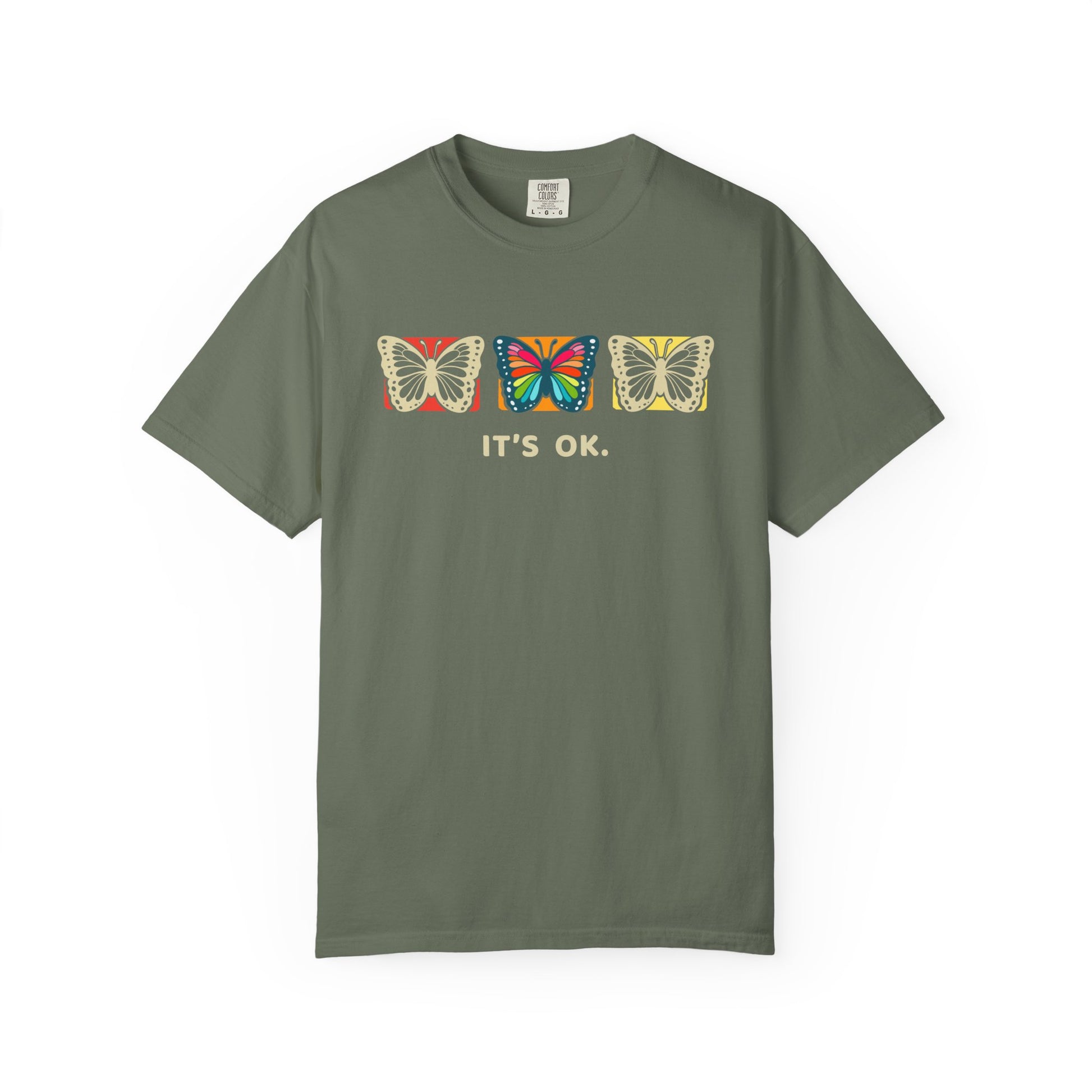 green 'it’s ok' butterfly shirt featuring with three butterflies and simple positive affirmation in bold cream text