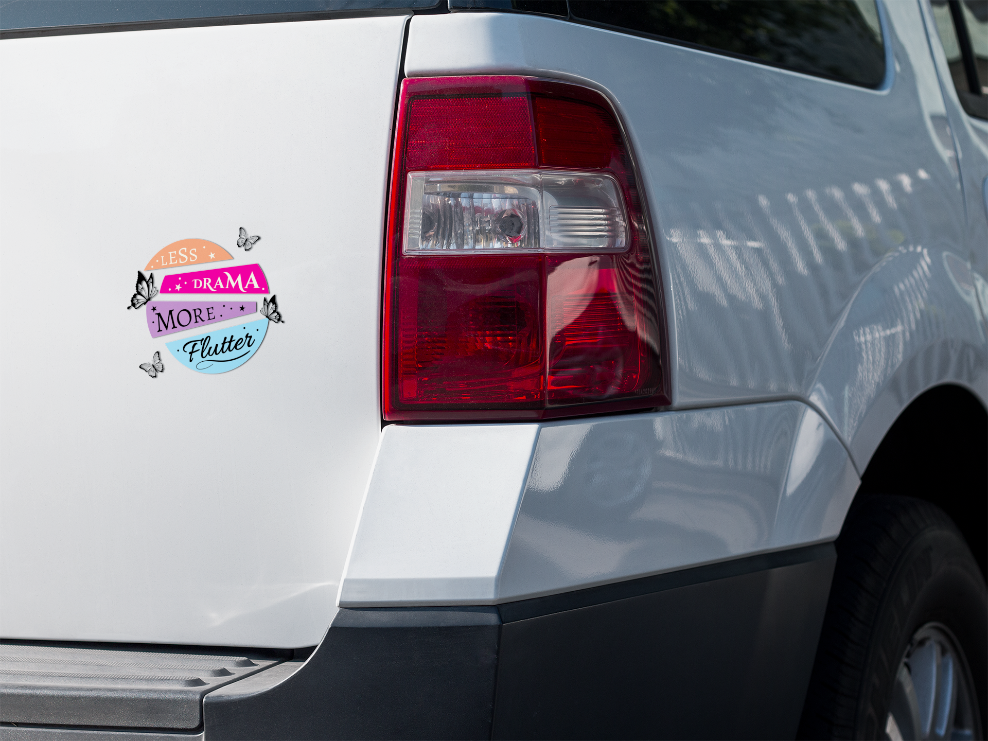 funny butterfly drama sticker used as car decal on a car's rear light
