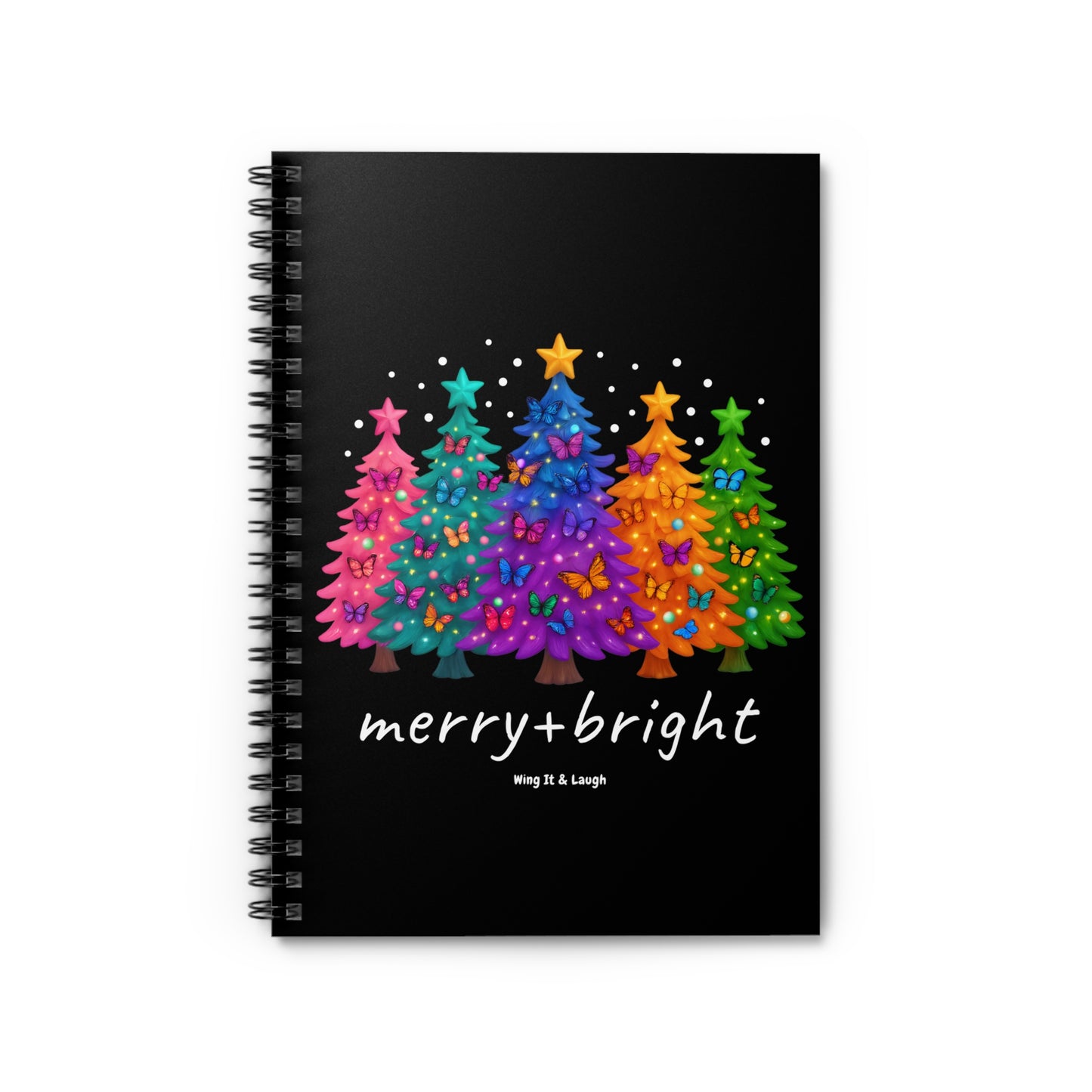 Black 6x8 notebook with colorful Christmas trees and 'merry + bright' text on a white background