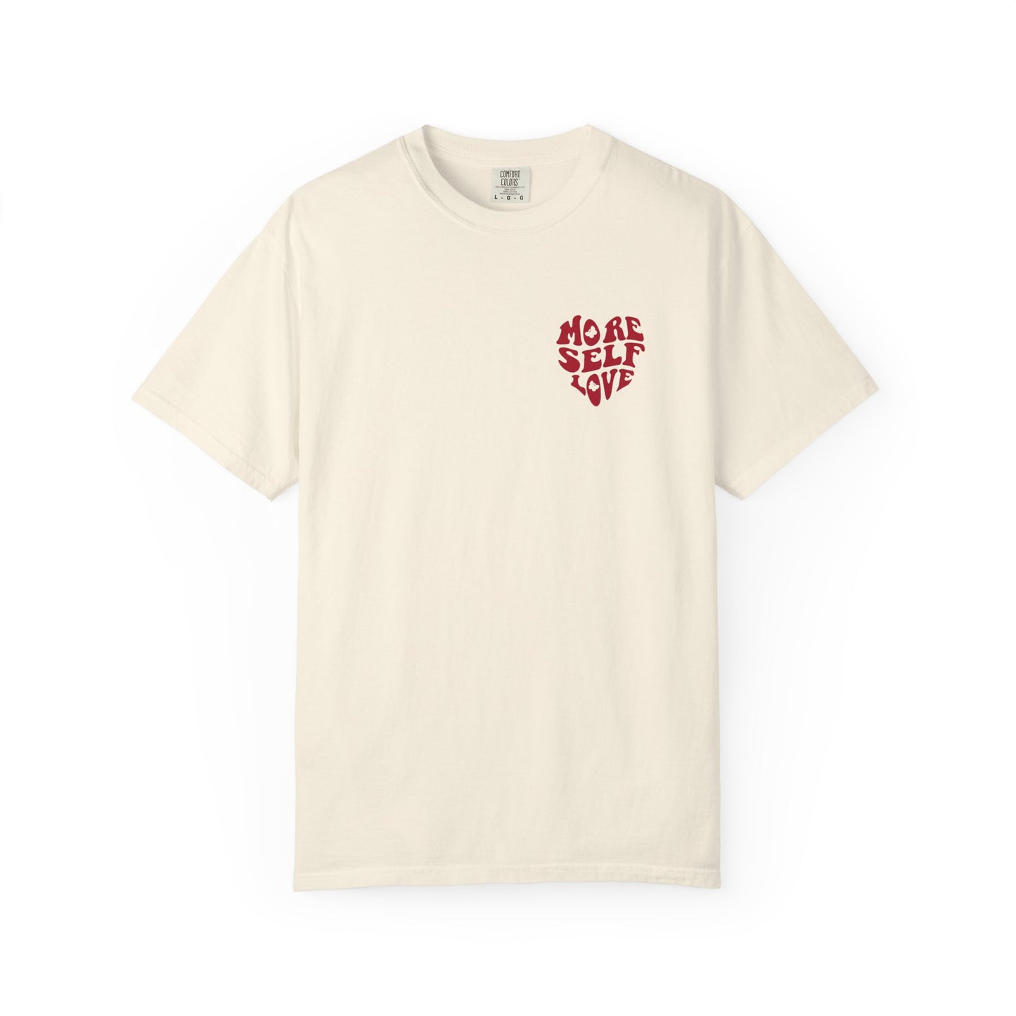 Cream More Self Love butterfly shirt with small front heart affirmation design on a white background