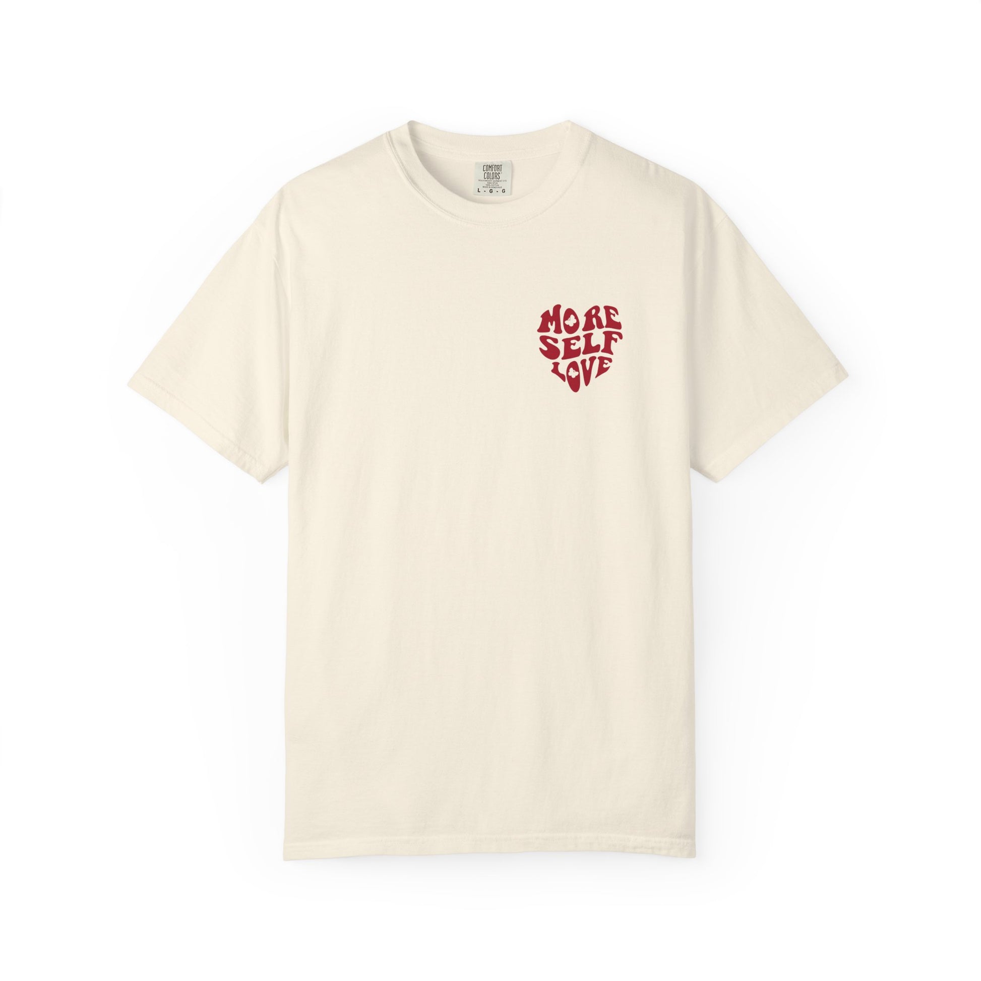 Cream More Self Love butterfly shirt with small front heart affirmation design on a white background
