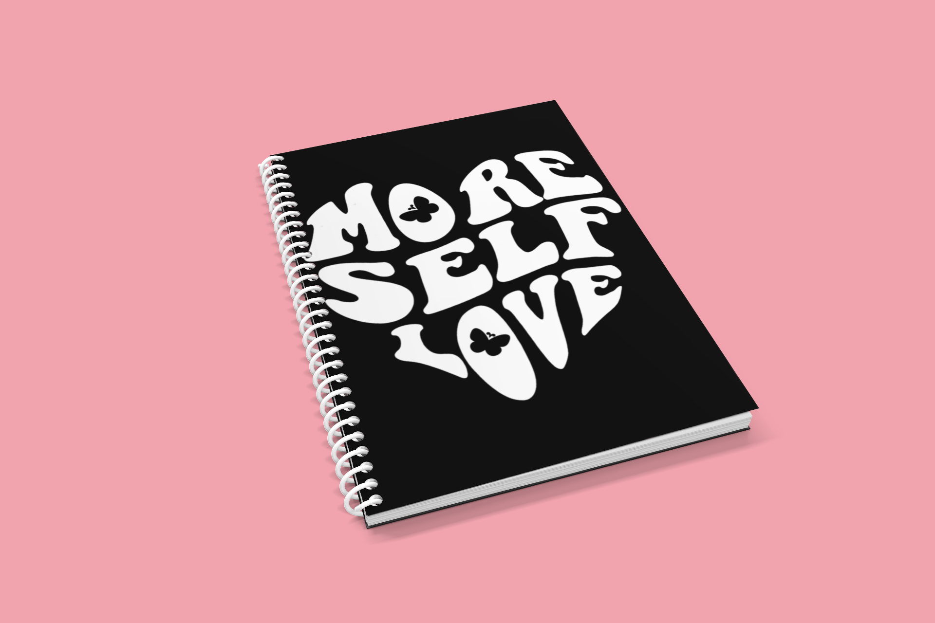 More Self Love butterfly affirmation notebook styled on pink background