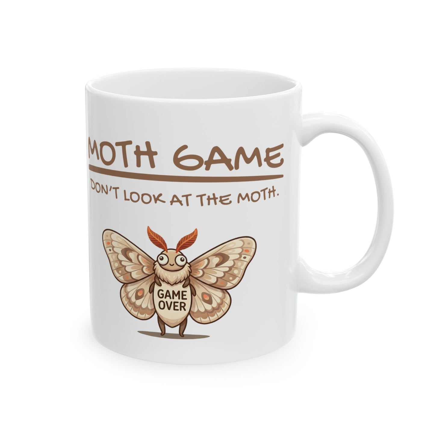 White ceramic 11oz mug featuring the phrase “Moth Game Don’t Look At The Moth” with a cute moth graphic and Game Over text on a white background