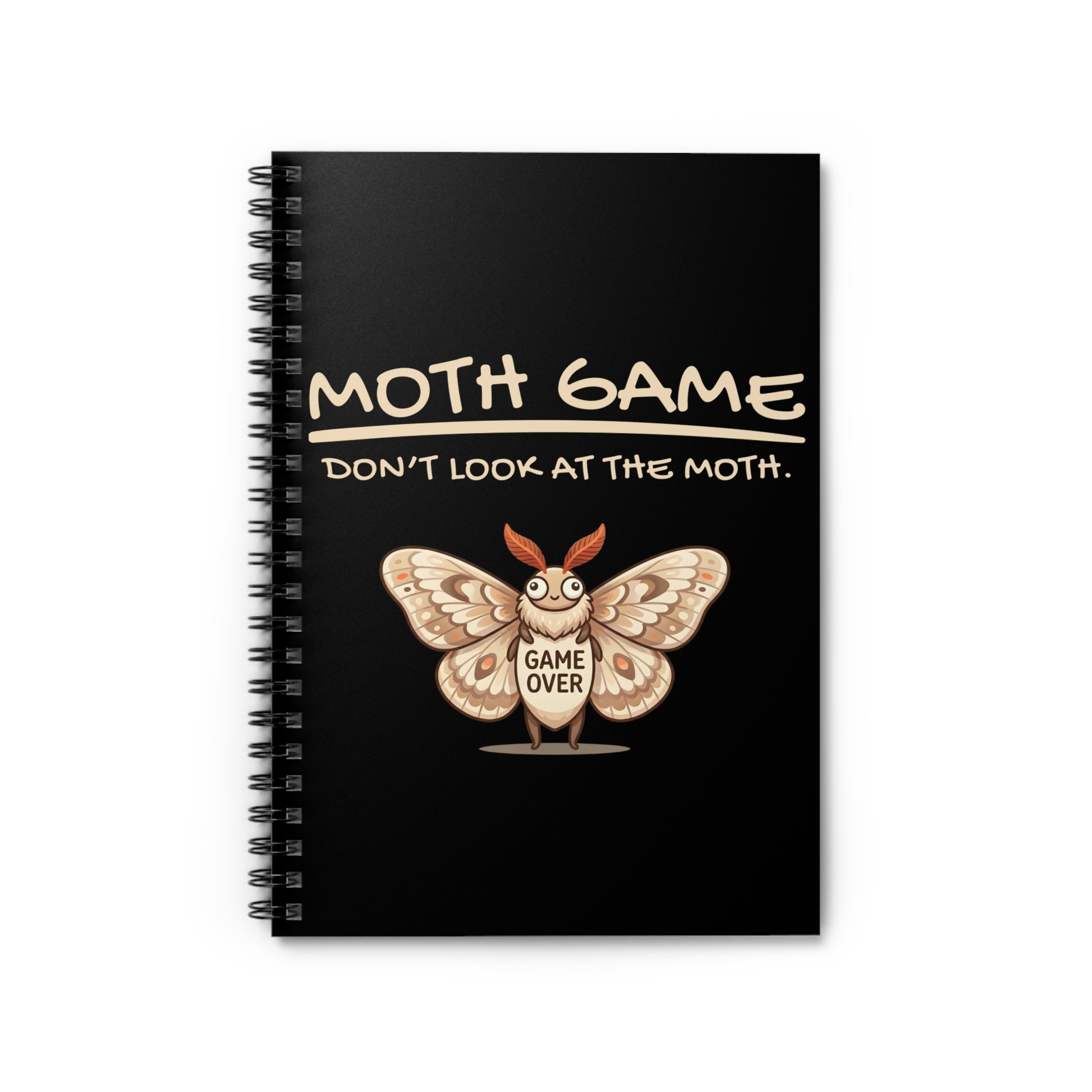 Black spiral notebook featuring the phrase “Moth Game Don’t Look At The Moth” with a cute moth graphic and Game Over text on a white background