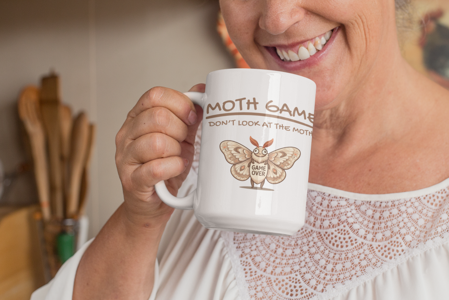 Woman holding a funny Moth Game mug featuring a cute moth illustration and gaming humor text