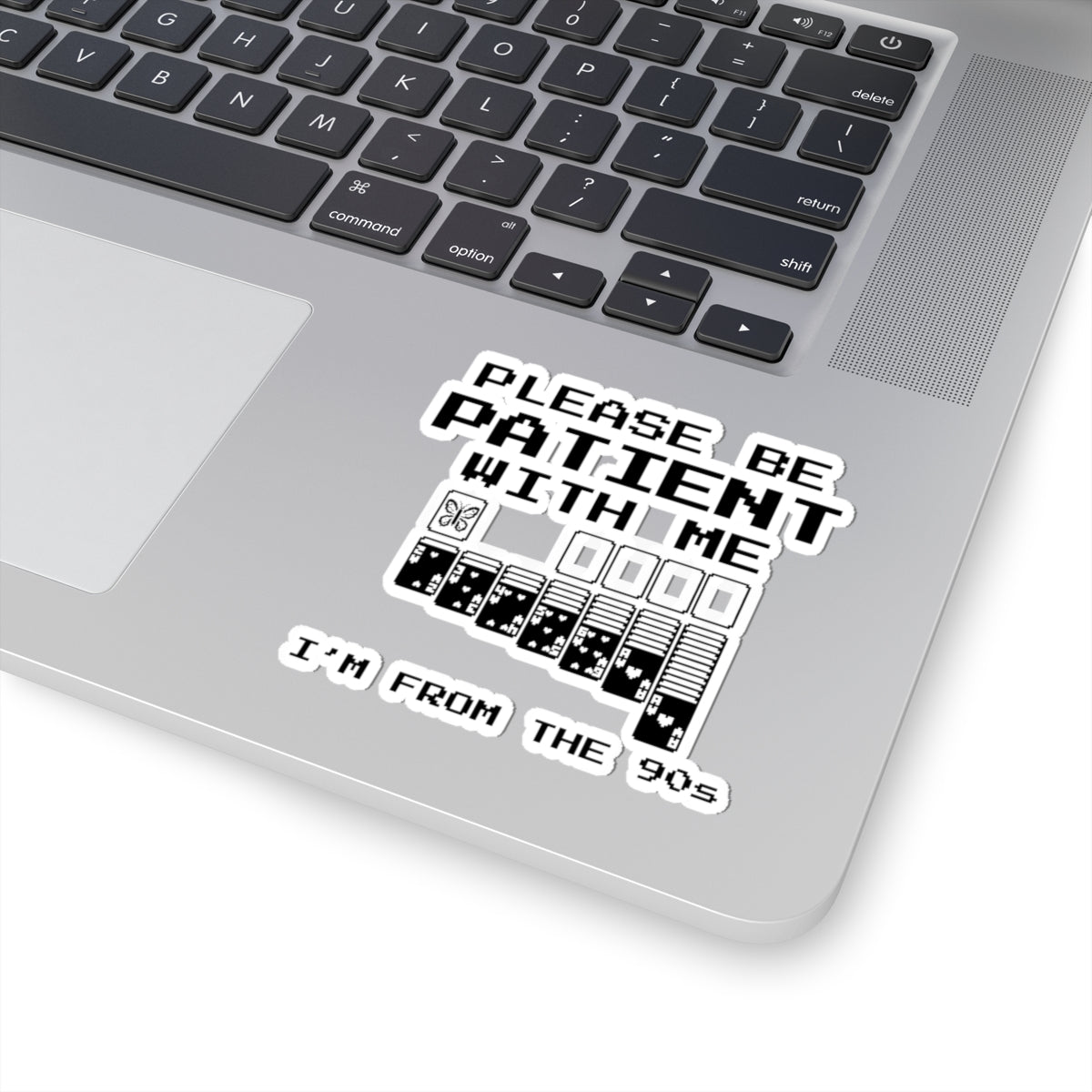 Funny antisocial butterfly sticker on laptop 90s nostalgia introvert humor design on the keyboard.