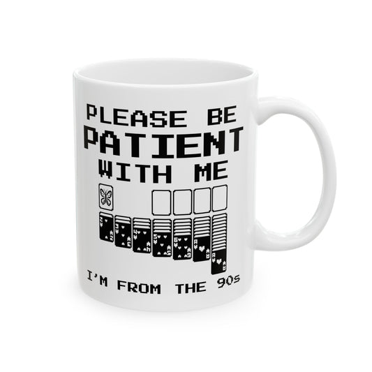 Please Be Patient With Me I'm From The 90s butterfly coffee mug with retro solitaire design on a white background