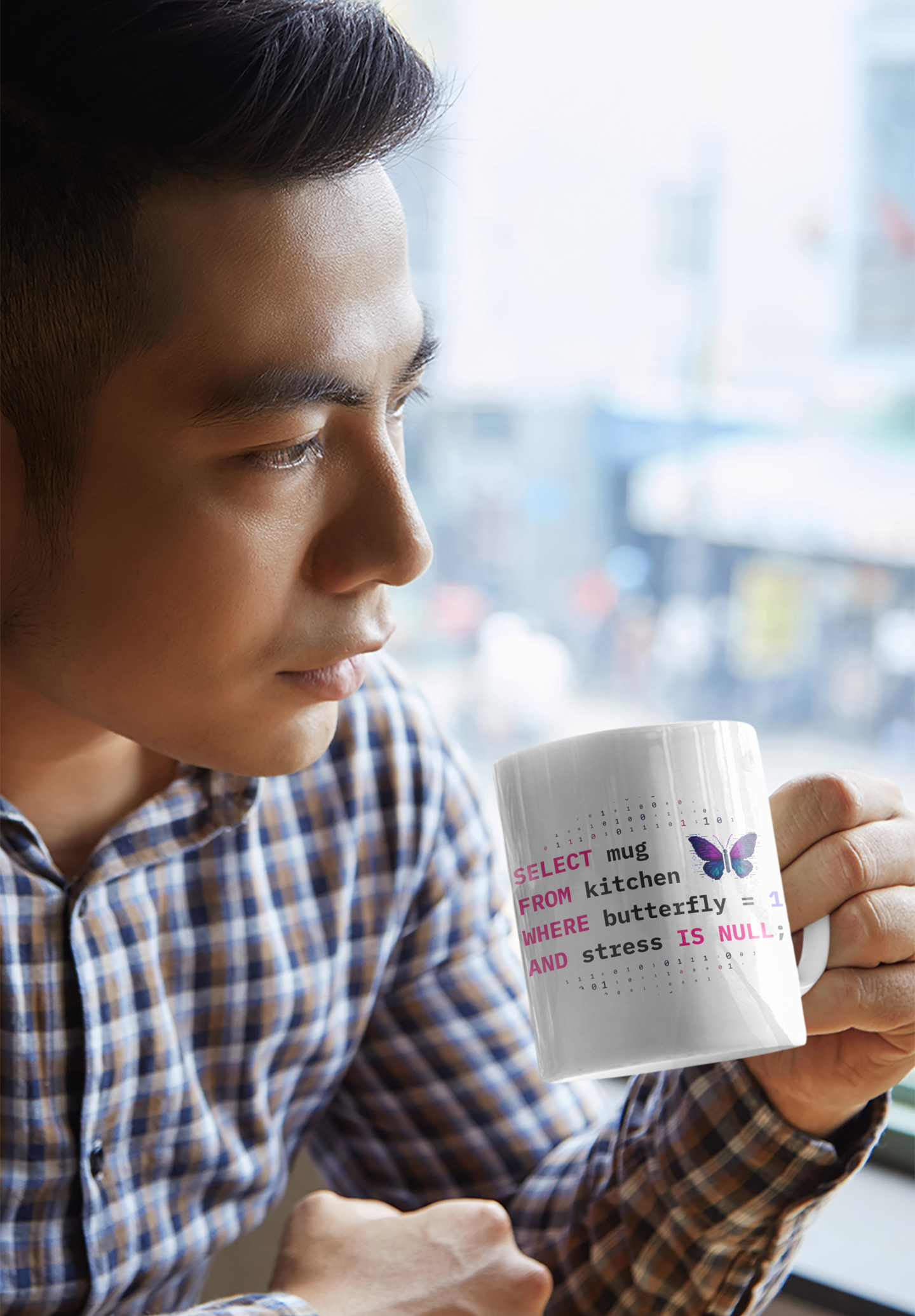 serious man holding a coffee cup, featuring SQL coding language and a butterfly design, sitting by a window