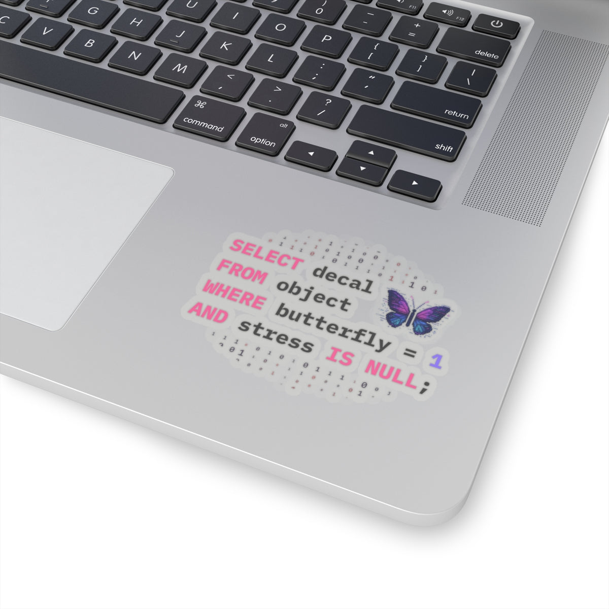 laptop with a programmer vinyl sticker featuring a butterfly pixel art, on a white background