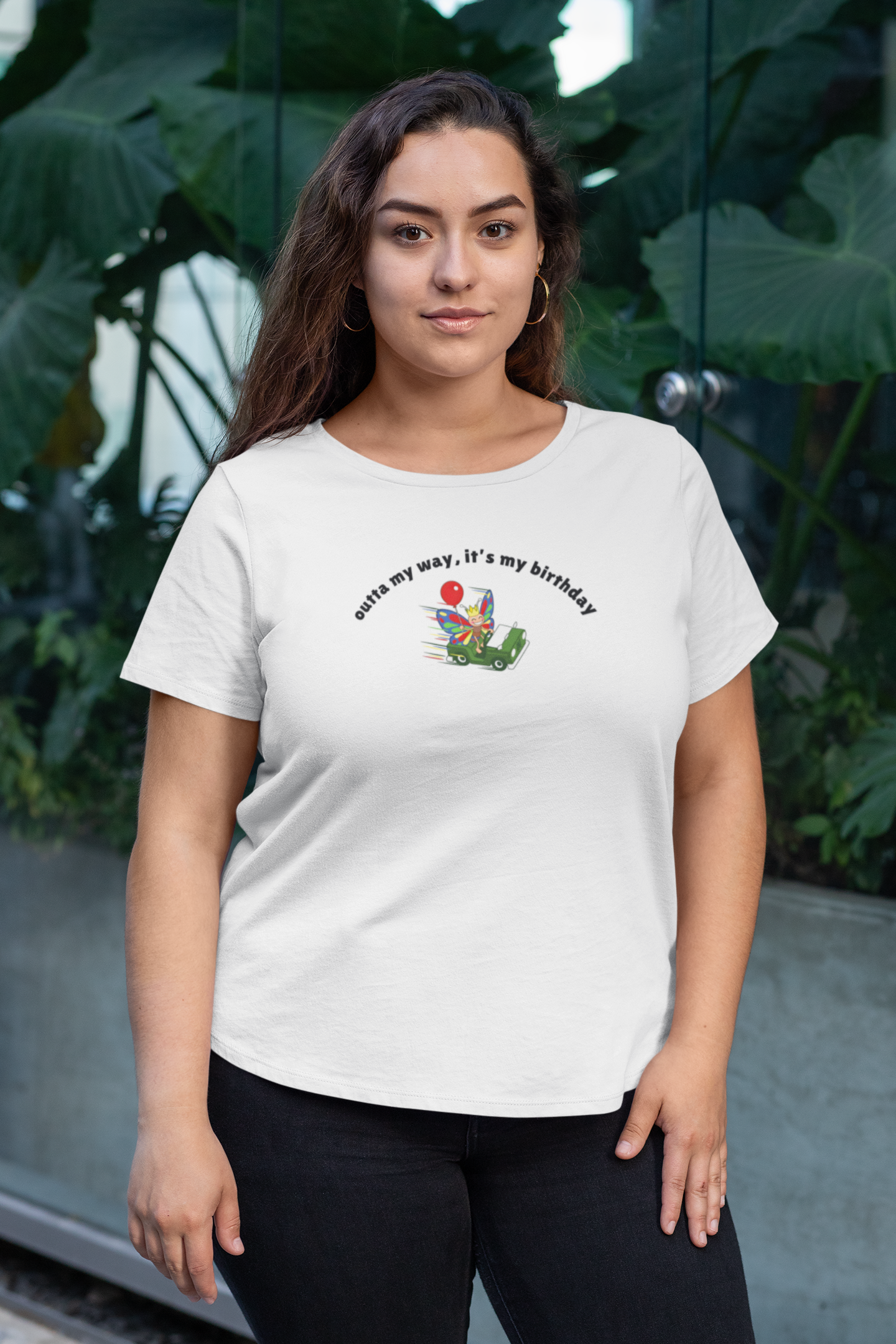 Woman wearing a white butterfly birthday graphic tee featuring a colorful butterfly and funny birthday statement design.